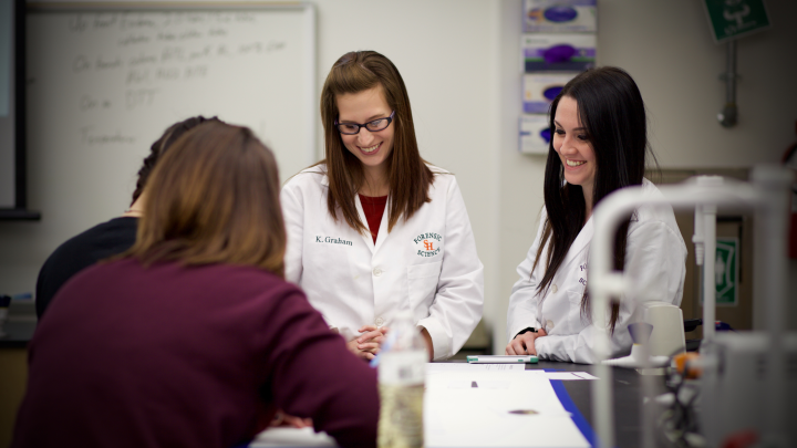 SHSU Department of Forensic Science students from Dr. Patrick Buzzini's classes teach a lesson to high school students interested in pursuing careers in criminal justice allowing them to get first hand experience